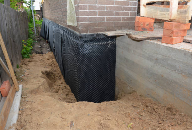 SJ Waterproofing Pros technician performing targeted Foundation Crack Repair assessment in Pomona, KS